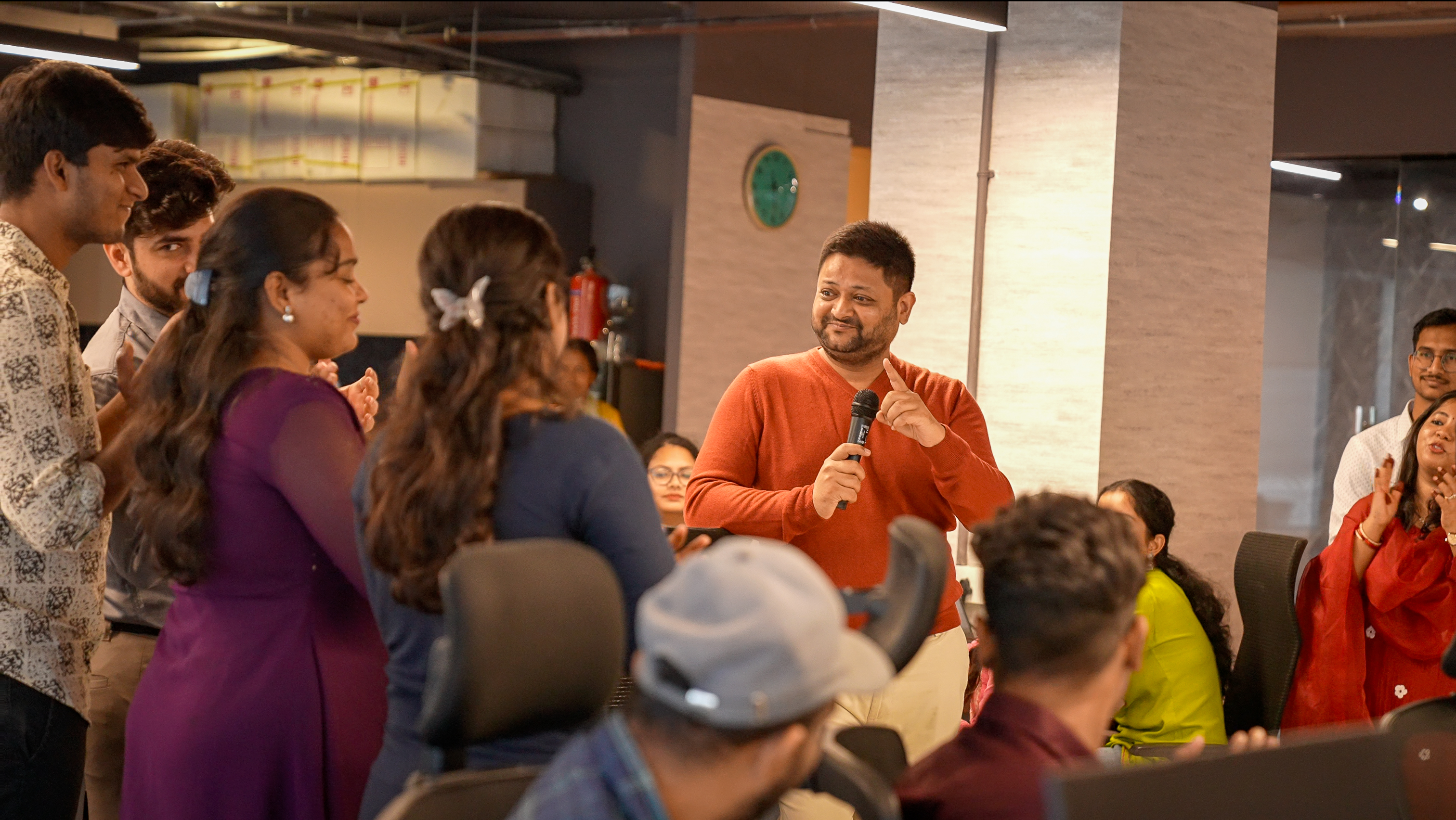 Two team members collaborating on a project at Ethika